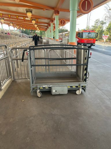 Image of a metal platform lift parked up ready for use