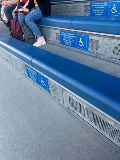 Tiered bench seating with blue padding