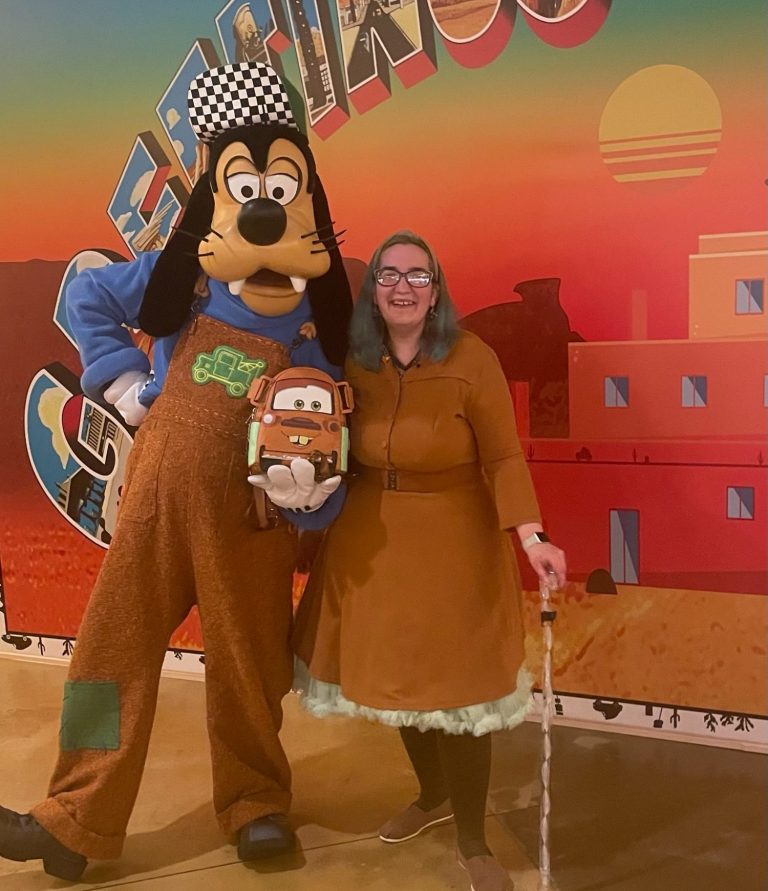 Image shows Jody meeting Goofy in his mater themed dungarees at hotel santa fe