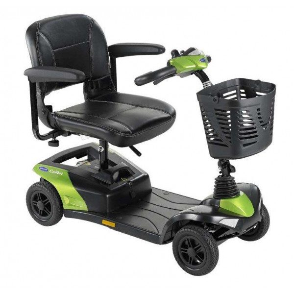 Image of a green and black compact mobility scooter with a basket