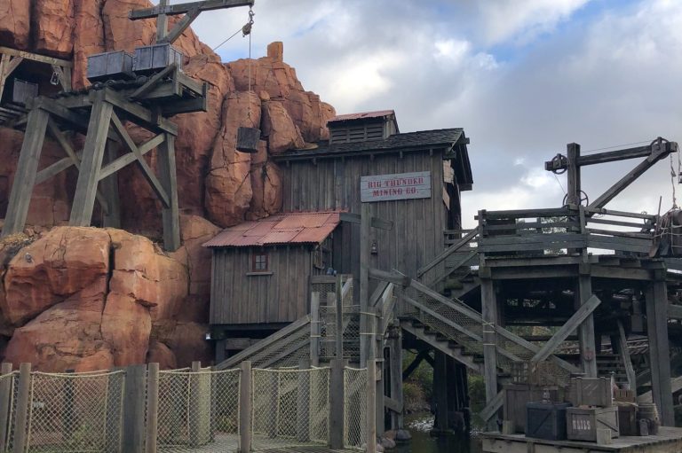 Image of stairways and wooden buildings on the big thunder island as viewed from the Molly Brown