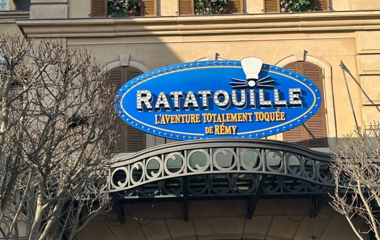 Photo of the outside of the ride with a blue sign saying ratatouille