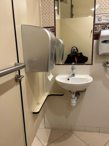 sink with a mirror above it