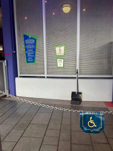 Image of a chain rope with a flag on with a wheelchair symbol