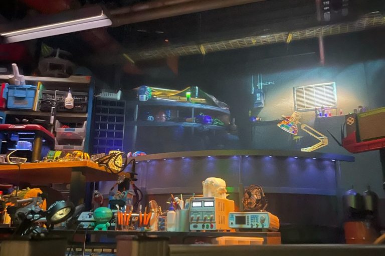 Image shows the pre show area of the WEB ride with a lot of technical and scientific equipment displayed