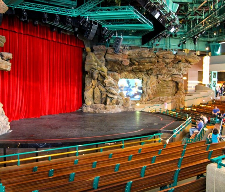 Interior of the videopolis theatre with rows of bench seating