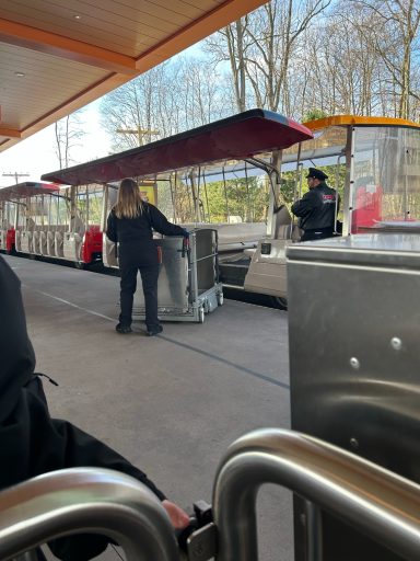 a wheelchair platform lift is being moved into position next to the ride vehicle